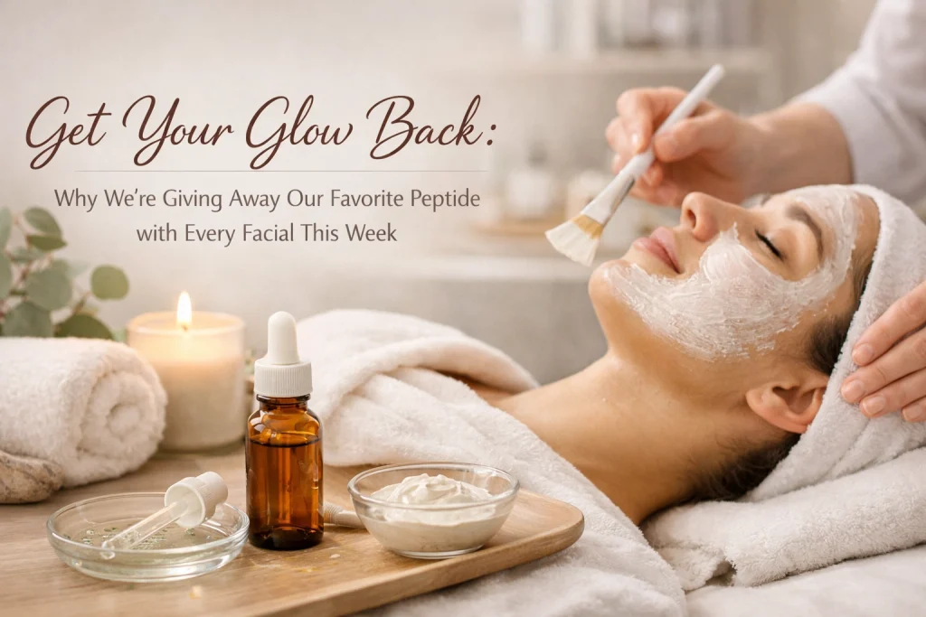 Person applying a glowing face mask with skincare products nearby.